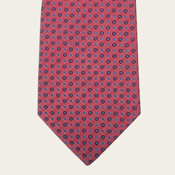 Crvena kravata sa teget i belim krugovima