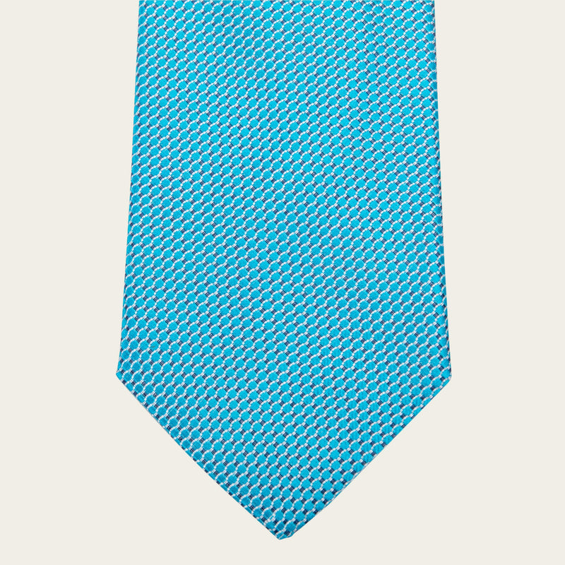 Tirkizno plava kravata sa geometrijskim oblicima