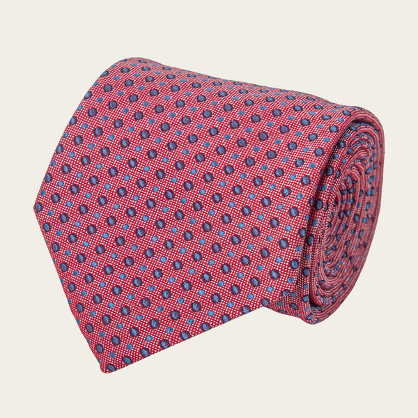 Crvena kravata sa teget i belim krugovima
