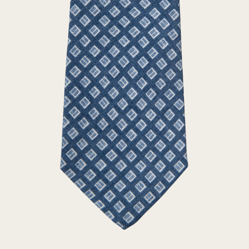 Plava kravata sa kvadratima